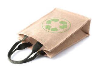 Shopping bag sack and recycle symbol on white background