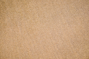 Golden brown sand on beach