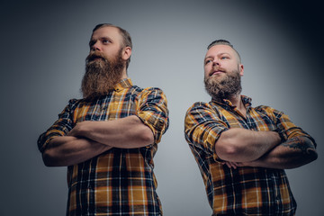 Two bearded men in yellow plaid shirt.