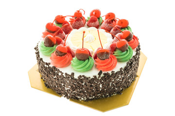 Ice cream cake with christmas theme and cheery on top
