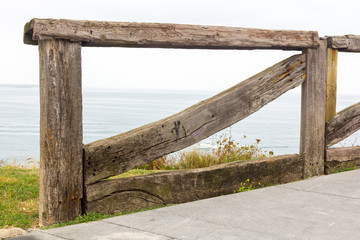 Old wooden railing seaside