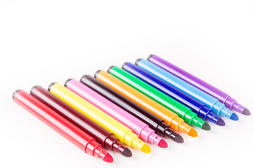 Rainbow colored pack of markers isolated on white background