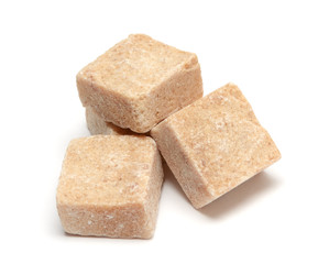Brown sugar cube isolated on white background