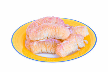 Thailand pomelo fruit on the plate orange and white background.