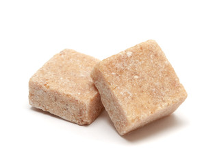 Brown sugar cube isolated on white background