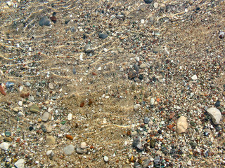Pebbles in  the maritime waters