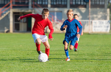  Boys kicking ball