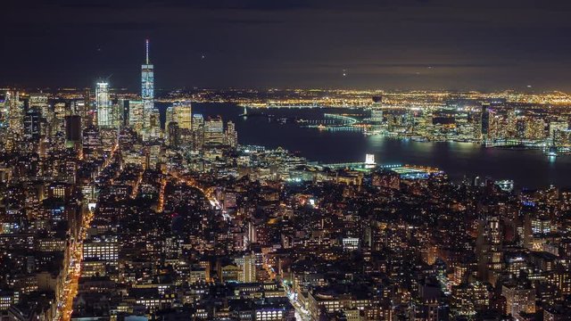 Manhattan aerial panorama cityscape skyline. Timelapse. Far ahead of the Statue of Liberty can be seen. New York City, USA