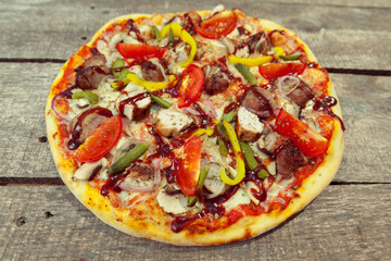 pizza on wooden table