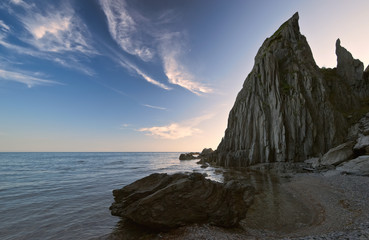 Coastal, sea cliffs at sunset.
