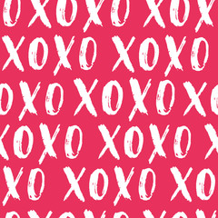 Valentine's Day vector seamless pattern. Hand written doodle XO XO on red isolated background. Cute pattern label design.
