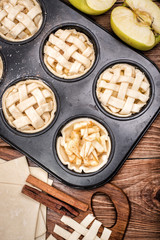 Fresh homemade delicious apple muffins . Concept of cooking.