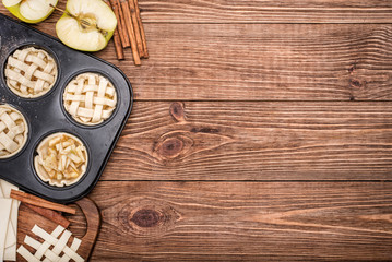 Fresh homemade delicious apple muffins . Concept of cooking.