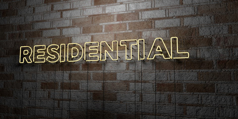 Fototapeta premium RESIDENTIAL - Glowing Neon Sign on stonework wall - 3D rendered royalty free stock illustration. Can be used for online banner ads and direct mailers..