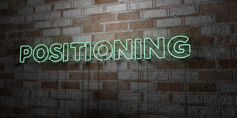 POSITIONING - Glowing Neon Sign on stonework wall - 3D rendered royalty free stock illustration.  Can be used for online banner ads and direct mailers..