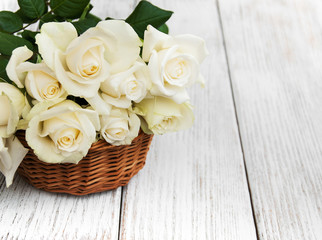 White roses in a basket