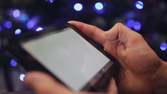 Man hand using tablet on christmas 