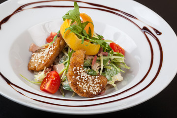 Salad with fried Pike perch