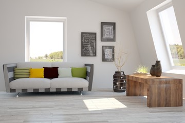 White room with sofa and green landscape in window. Scandinavian interior design