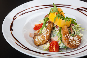 Salad with fried Pike perch