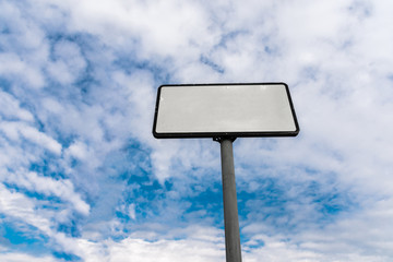 blank road sign on background sky