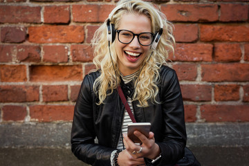 Woman listening music on her headphones