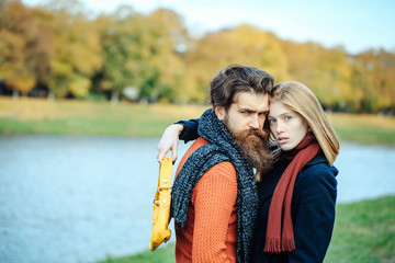 Young couple in autumn park