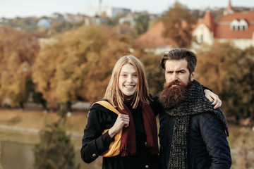 Young couple in autumn park