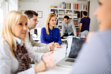 Businesspeople collaborating in office