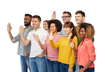 Obraz premium international group of happy people waving hand