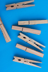 clothespins on a blue background
