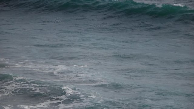 Slow motion, 120fps, of green sea wave with white splash. Beautiful natural background for amazing intro in excellent four times decelerated full HD clip. 
