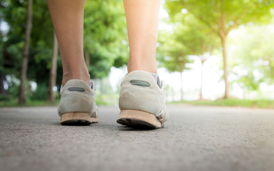 Jogger fitness shoe in the background and open space around him.