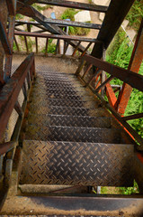 rusty and old looking tower staircase