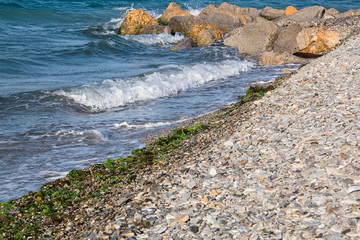 Rocky shore of the Black Sea. Waves hit the rocks. Gelendzhik. Russia.