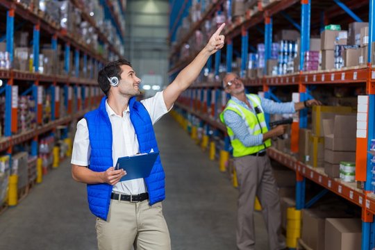 Warehouse workers interacting with each other