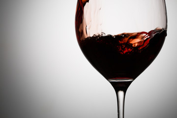 Red wine beautiful moves in glass