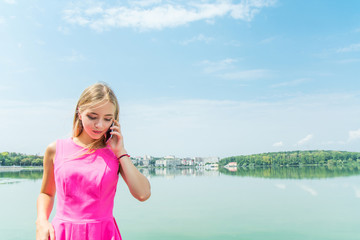 Young pretty beautiful woman girl talking on mobile phone.