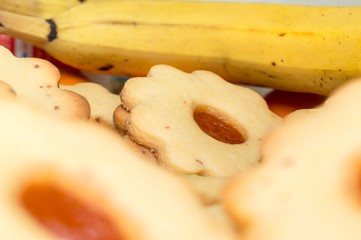 Homemade apricot jam Linzer with fruits close up
