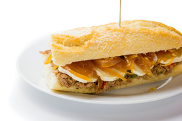 Meat sandwich with sweet onion and goat cheese. Venezuelan food