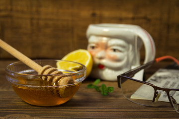 Cup of tea with honey and lemon