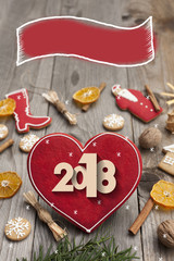 Christmas heart shaped gingerbread background. Winter holidays atmosphere. Snoflakes. Greeting card for Christmas and New Year`s Eve holiday 2018.Winter holiday poster.Space left for copy..