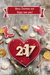 Christmas heart shaped gingerbread background. Winter holidays atmosphere. Snoflakes. Greeting card for Christmas and New Year`s Eve holiday 2017.Winter holiday poster.