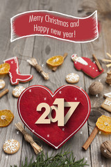 Christmas heart shaped gingerbread background. Winter holidays atmosphere. Snoflakes. Greeting card for Christmas and New Year`s Eve holiday 2017.Winter holiday poster.