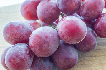 Grapes on a wooden base
