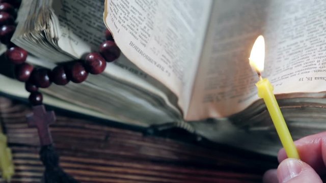 Bible and praying with a rosary