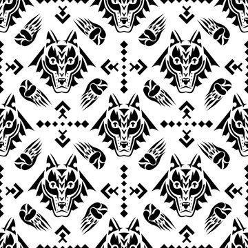 Vector illustration seamless geometric pattern with  wolf head in american indian folk style.