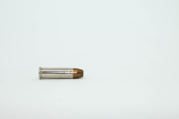 Bullet close-up on 38Super ammo isolated on white background