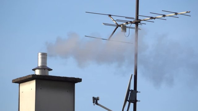 Smoke coming out of chimney