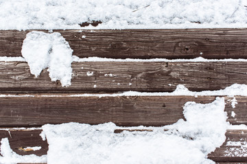 Snow on the wood background